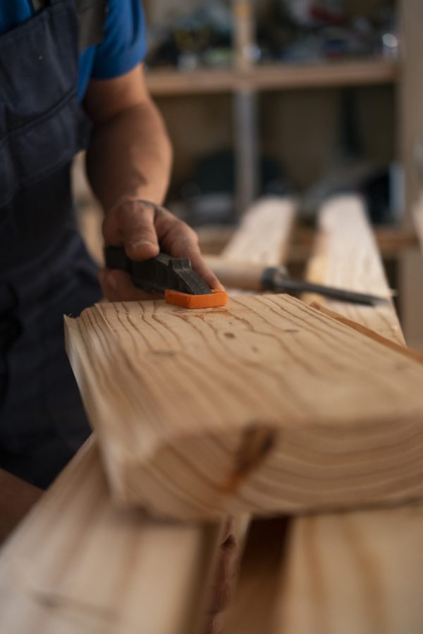 male-wood-worker-his-shop-working-with-tools-equipment